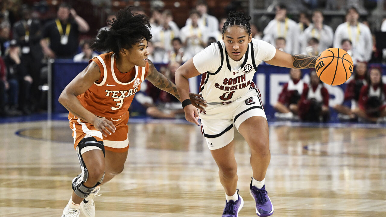 GREENVILLE, SOUTH CAROLINA - MARCH 09: Te-Hina Paopao #0 of the South Carolina Gamecocks dribbles against Rori Harmon #3 of the Texas Longhorns in the first quarter during the championship of the SEC women's basketball tournament at Bon Secours Wellness Arena on March 09, 2025 in Greenville, South Carolina.