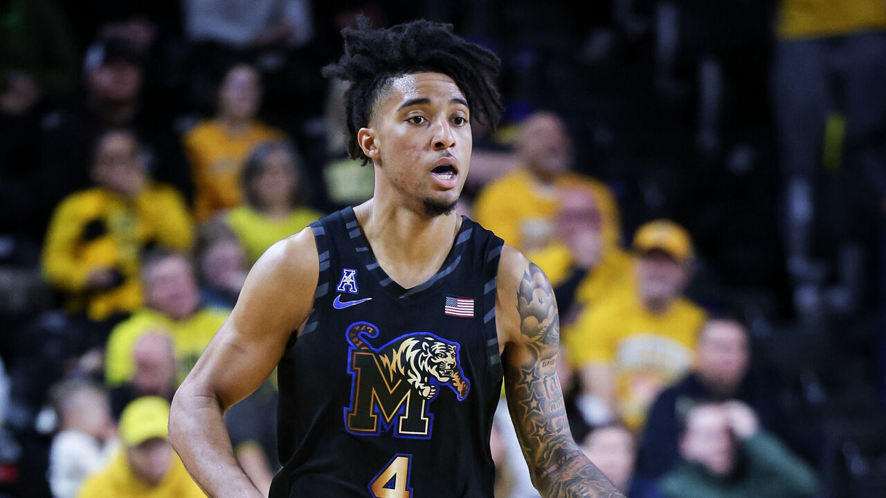 WICHITA, KS - FEBRUARY 16: Memphis Tigers guard PJ Haggerty (4) brings the ball up court against the Wichita State Shockers on February 16th, 2025 at Charles Koch Arena in Wichita, Kansas.