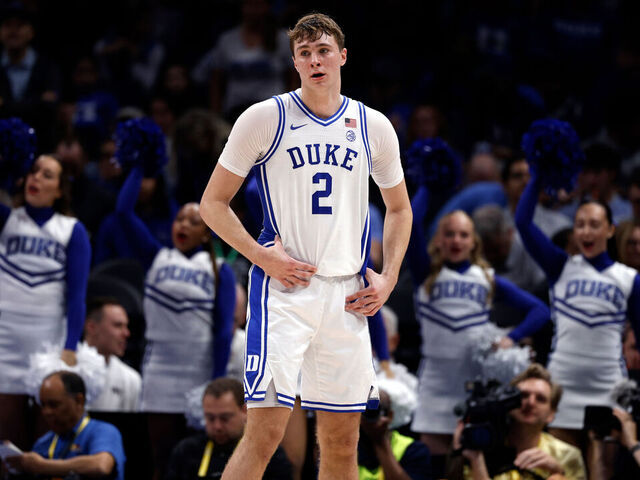 CHARLOTTE, NORTH CAROLINA - MARCH 13: Cooper Flagg #2 of the Duke Blue Devils looks on during the first half against the Georgia Tech Yellow Jackets in a quarterfinal game of the ACC men's basketball tournament at Spectrum Center on March 13, 2025 in Charlotte, North Carolina.