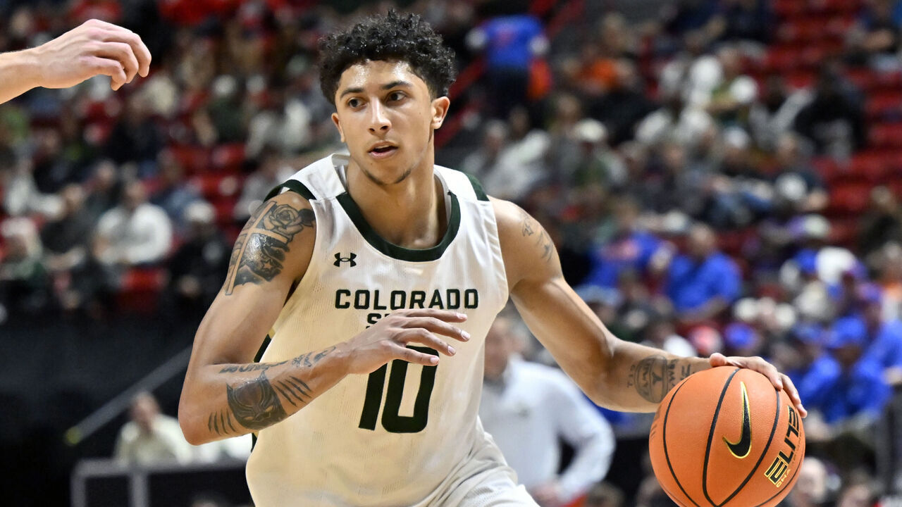 LAS VEGAS, NEVADA - MARCH 14: Nique Clifford #10 of the Colorado State Rams handles the ball against the Utah State Aggies during the second half of a semifinal game of the Mountain West men’s basketball tournament at the Thomas & Mack Center on March 14, 2025 in Las Vegas, Nevada. The Rams defeated the Aggies 83-72.