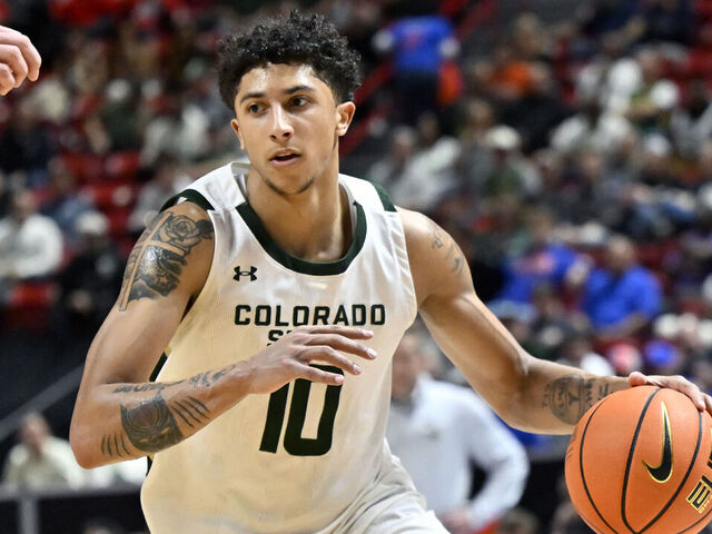LAS VEGAS, NEVADA - MARCH 14: Nique Clifford #10 of the Colorado State Rams handles the ball against the Utah State Aggies during the second half of a semifinal game of the Mountain West men’s basketball tournament at the Thomas & Mack Center on March 14, 2025 in Las Vegas, Nevada. The Rams defeated the Aggies 83-72.