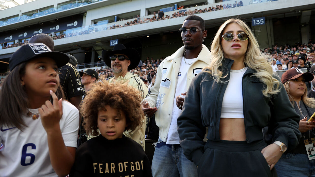 LOS ANGELES, CALIFORNIA - MARCH 15: Paul Pogba and family on the sidelines during a 1-0 Austin FC win over the Los Angeles FC at BMO Stadium on March 15, 2025 in Los Angeles, California.
