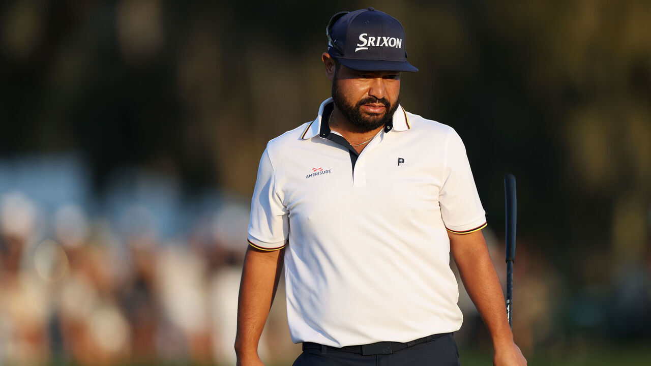 PONTE VEDRA BEACH, FLORIDA - MARCH 15: J.J. Spaun of the United States walks on the 18th green during the third round of THE PLAYERS Championship on the Stadium Course at TPC Sawgrass on March 15, 2025 in Ponte Vedra Beach, Florida.