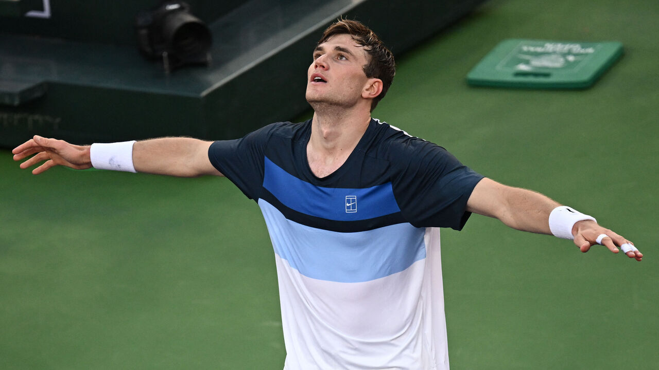 Britain's Jack Draper reacts after winning the men's singles semi-final tennis match against Spain's Carlos Alcaraz at the BNP Paribas Open at the Indian Wells Tennis Garden in Indian Wells, California, on March 15, 2025.