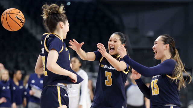 HENDERSON, NEVADA - MARCH 15: Gracie Gallegos #22, Sumayah Sugapong #3, and Sabrina Ma #15 of the UC San Diego Tritons celebrate after their team's 75-66 victory against the UC Davis Aggies to win the Big West Women's Basketball Tournament Championship game at Lee's Family Forum on March 15, 2025 in Henderson, Nevada.