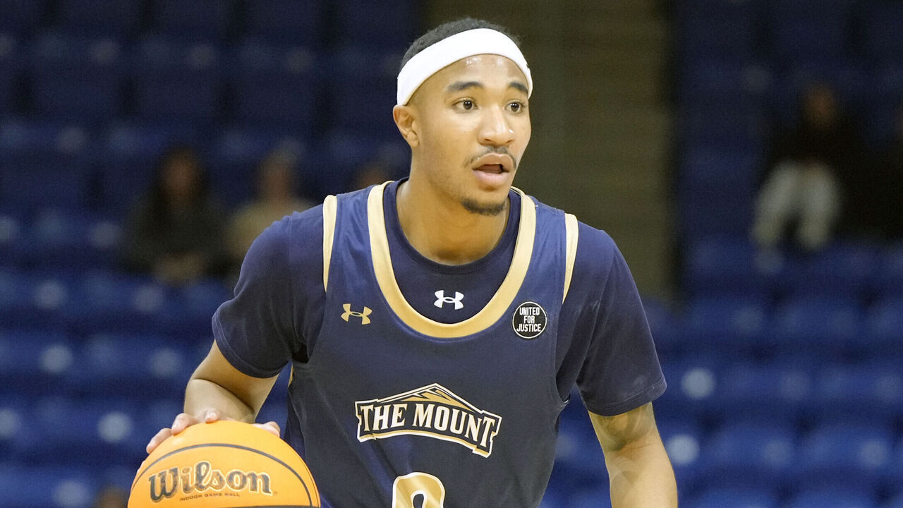 HAMDEN, CT - MACRH 06: Dallas Hobbs #8 of the Mount St. Mary's Mountaineers dribbles up ocurtl during a college basketball game against the Quinnipiac Bobcats at M & T Bank Arena on March 06, 2025 in Hamden, Connecticut.
