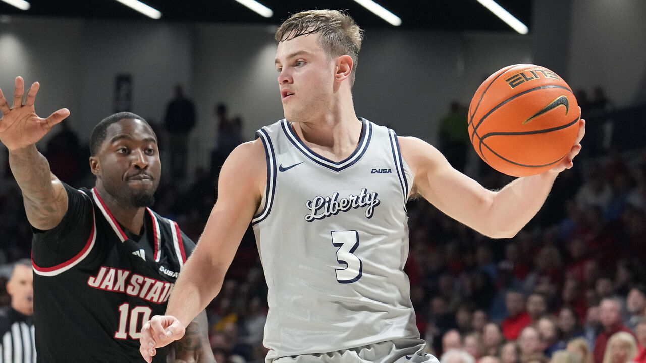 LYNCHBURG, VA - FEBRUARY 27: Kaden Metheny #3 of the Liberty Flames dribbles the ball during a college basketball game against the Jacksonville State Gamecocks at Liberty Arena on February 27, 2025 in Lynchburg, Virginia.