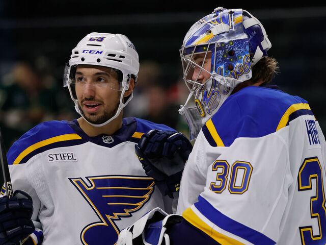 ST. PAUL, MN - MARCH 15: St. Louis Blues goaltender Joel Hofer (30) celebrates with center Jordan Kyrou (25) after winning an NHL game between the St. Louis Blues and Minnesota Wild on March 15th, 2025, at the Xcel Energy Center in St. Paul, MN.