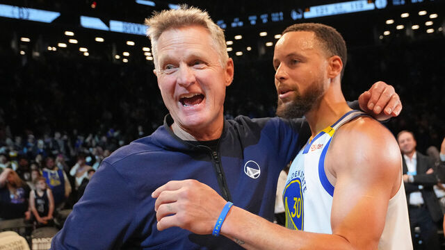 BROOKLYN, NY - MARCH 6: Head Coach Steve Kerr of the Golden State Warriors embraces Stephen Curry #30 of the Golden State Warriors after the game against the Brooklyn Nets on March 6, 2025 at Barclays Center in Brooklyn, New York. Mandatory Copyright Notice: Copyright 2025 NBAE