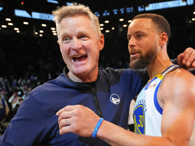 BROOKLYN, NY - MARCH 6: Head Coach Steve Kerr of the Golden State Warriors embraces Stephen Curry #30 of the Golden State Warriors after the game against the Brooklyn Nets on March 6, 2025 at Barclays Center in Brooklyn, New York. Mandatory Copyright Notice: Copyright 2025 NBAE
