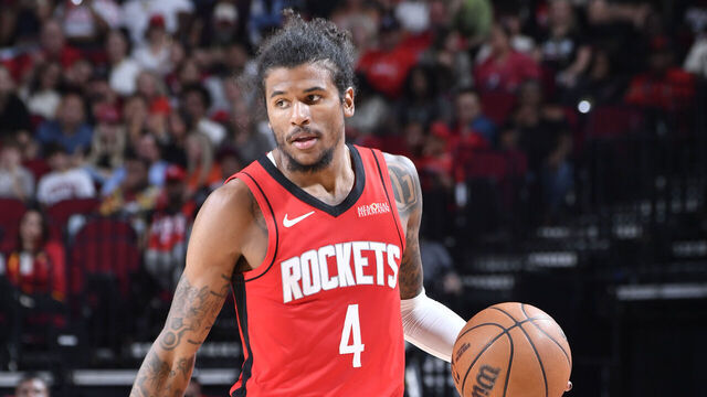 HOUSTON, TX - MARCH 15: Jalen Green #4 of the Houston Rockets Slash Remote against the Chicago Bulls on March 15, 2025 at the Toyota Center in Houston, Texas. Mandatory Copyright Notice: Copyright 2025 NBAE