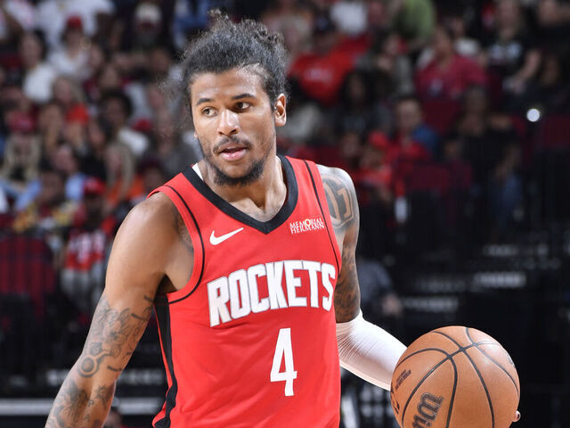 HOUSTON, TX - MARCH 15: Jalen Green #4 of the Houston Rockets Slash Remote against the Chicago Bulls on March 15, 2025 at the Toyota Center in Houston, Texas. Mandatory Copyright Notice: Copyright 2025 NBAE