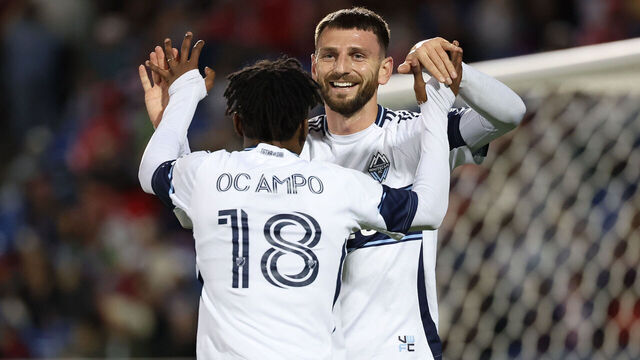 FRISCO, TEXAS - MARCH 15: Tristan Blackmon #33 of Vancouver Whitecaps FC celebrates with Édier Ocampo #18 after scoring his teams first goal during the second half of an MLS match against FC Dallas at Toyota Stadium on March 15, 2025 in Frisco, Texas.