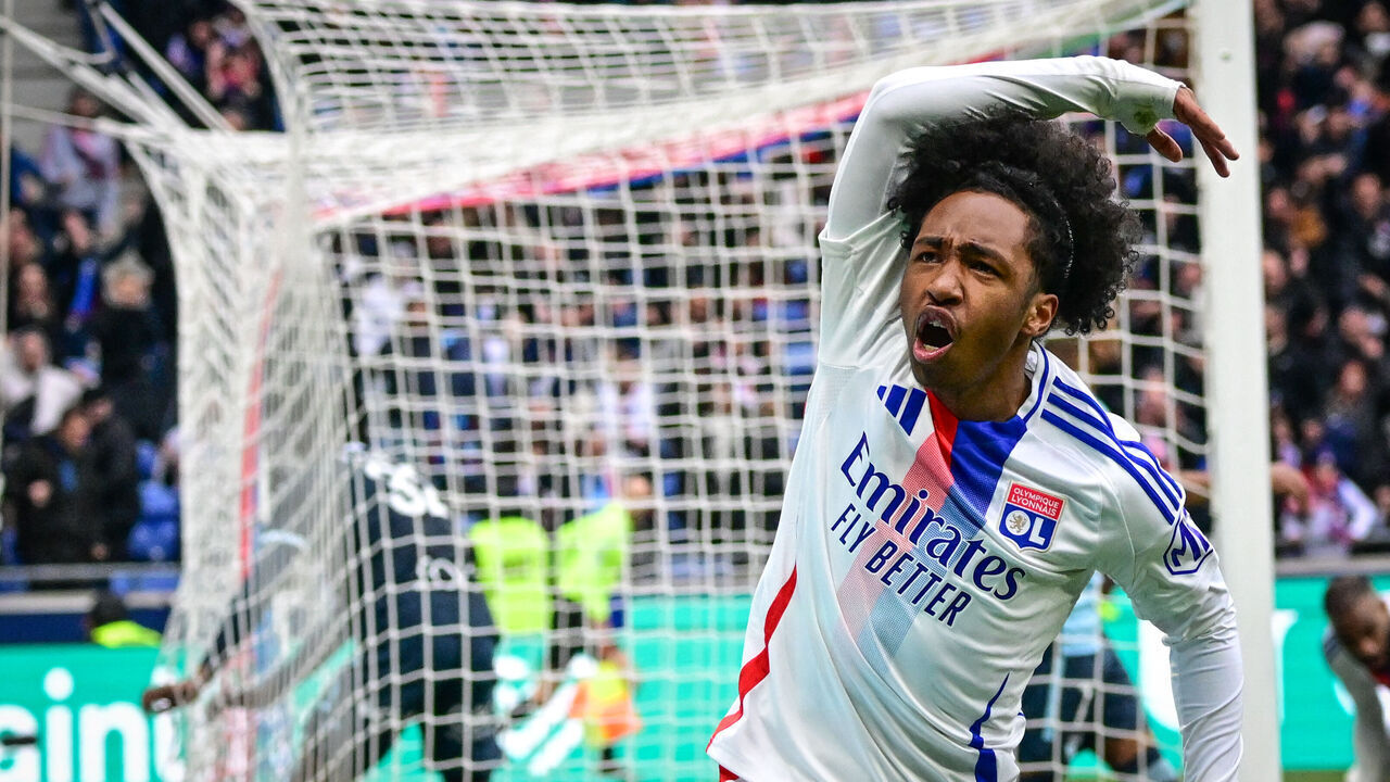 Lyon's Belgium forward #11 Malick Fofana celebrates after scoring a goal during the French L1 football match between Olympique Lyonnais (OL) and Le Havre AC at the Groupama Stadium in Decines-Charpieu, central-eastern France, on March 16, 2025.