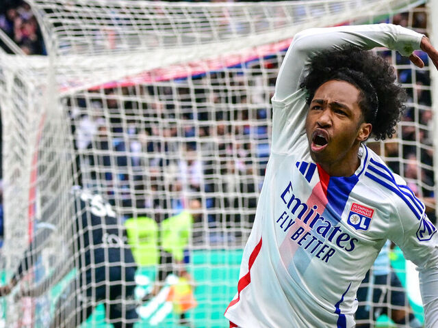 Lyon's Belgium forward #11 Malick Fofana celebrates after scoring a goal during the French L1 football match between Olympique Lyonnais (OL) and Le Havre AC at the Groupama Stadium in Decines-Charpieu, central-eastern France, on March 16, 2025.