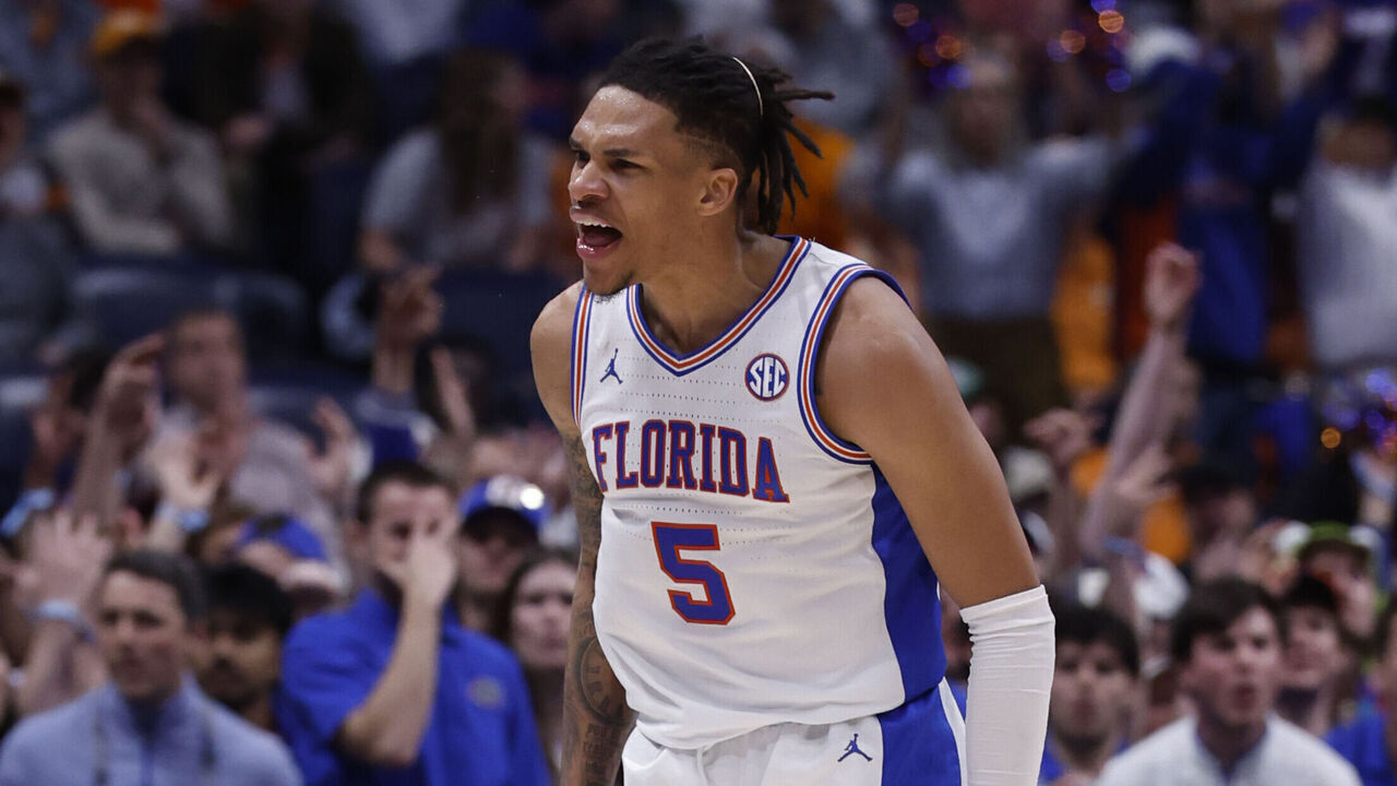 NASHVILLE, TN - MARCH 16: Florida Gators guard Will Richard (5) yells to his bench after hitting a 3-pointer during the SEC Tournament Championship game between the Florida Gators and Tennessee Volunteers March 16, 2025 at Bridgestone Arena in Nashville, Tennessee.