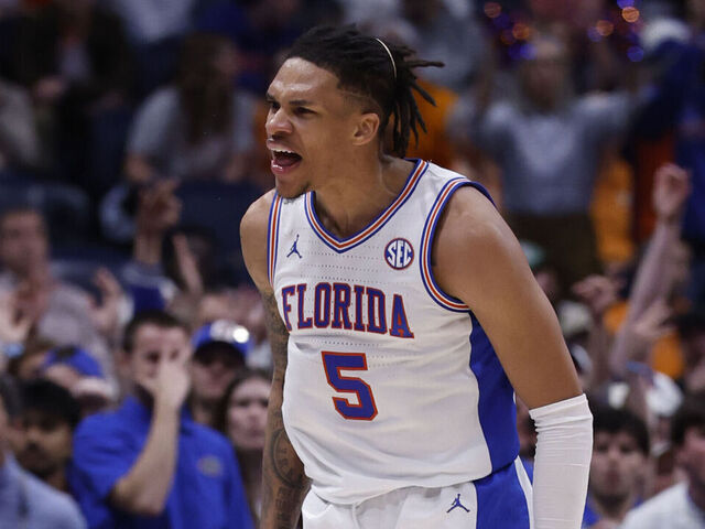 NASHVILLE, TN - MARCH 16: Florida Gators guard Will Richard (5) yells to his bench after hitting a 3-pointer during the SEC Tournament Championship game between the Florida Gators and Tennessee Volunteers March 16, 2025 at Bridgestone Arena in Nashville, Tennessee.