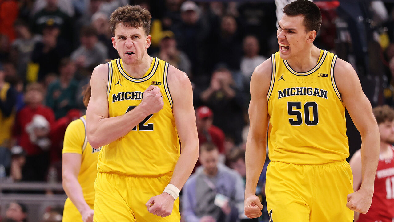 INDIANAPOLIS, INDIANA - MARCH 16: Will Tschetter #42 and Vladislav Goldin #50 of the Michigan Wolverines celebrate against the Wisconsin Badgers during the second half in the Big Ten men's basketball tournament championship at Gainbridge Fieldhouse on March 16, 2025 in Indianapolis, Indiana.