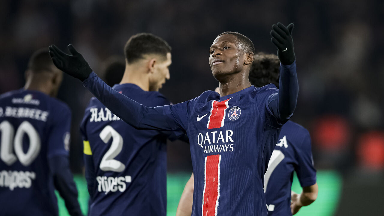 PARIS, FRANCE - MARCH 16: Nuno Mendes of Paris Saint Germain (C) celebrating his goal with his teammates during the France Ligue 1 match between Paris Saint-Germain FC and Olympique de Marseille at Parc des Princes on March 16, 2025 in Paris, France.