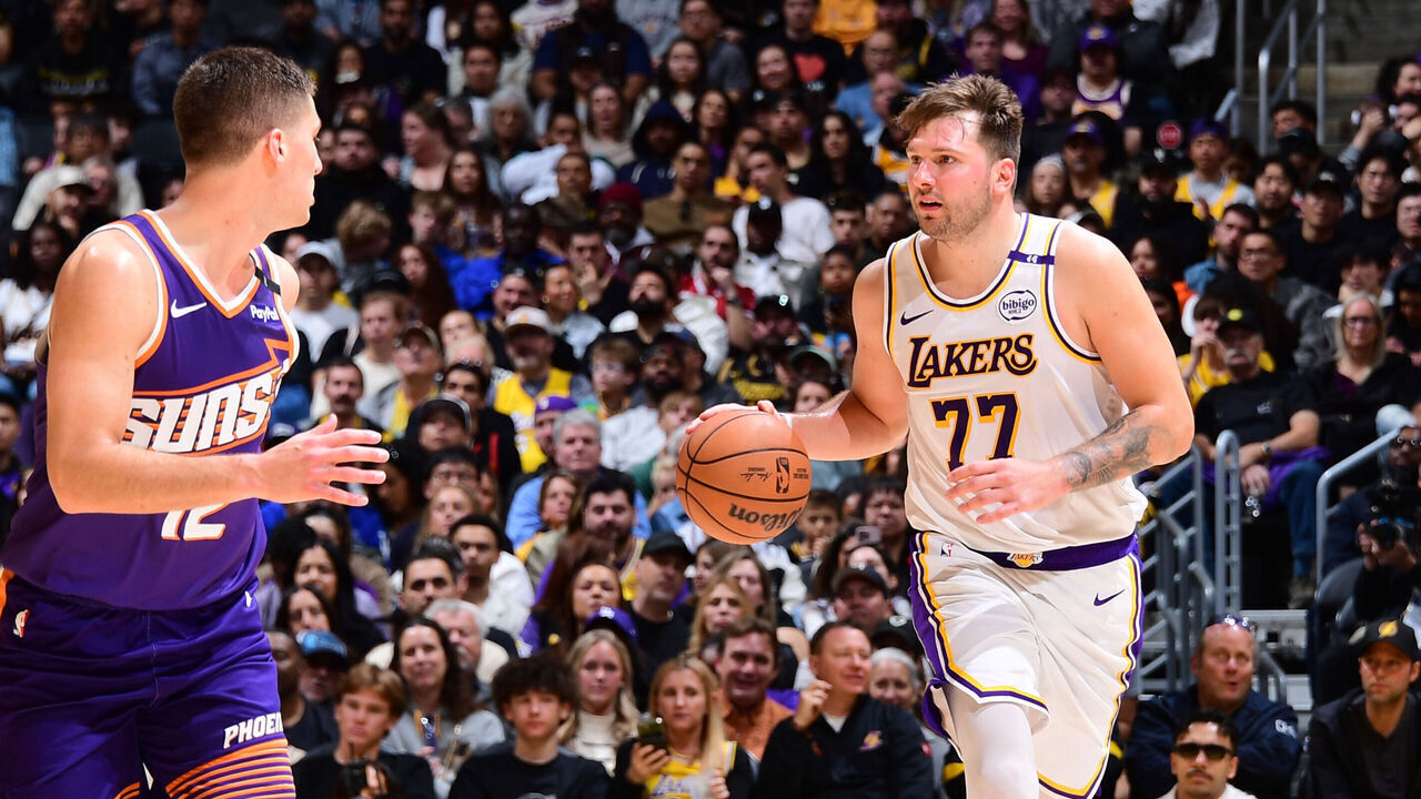 LOS ANGELES, CA - MARCH 16: Luka Doncic #77 of the Los Angeles Lakers dribbles the ball during the game against the Phoenix Suns on March 16, 2025 at Crypto.Com Arena in Los Angeles, California. NOTE TO USER: User expressly acknowledges and agrees that, by downloading and/or using this Photograph, user is consenting to the terms and conditions of the Getty Images License Agreement. Mandatory Copyright Notice: Copyright 2025 NBAE