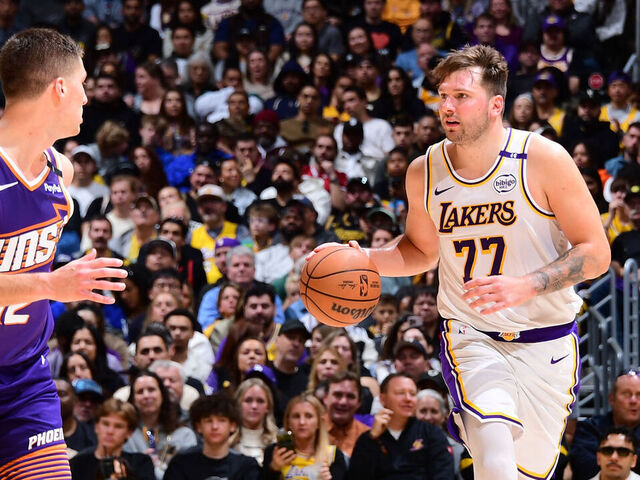 LOS ANGELES, CA - MARCH 16: Luka Doncic #77 of the Los Angeles Lakers dribbles the ball during the game against the Phoenix Suns on March 16, 2025 at Crypto.Com Arena in Los Angeles, California. NOTE TO USER: User expressly acknowledges and agrees that, by downloading and/or using this Photograph, user is consenting to the terms and conditions of the Getty Images License Agreement. Mandatory Copyright Notice: Copyright 2025 NBAE