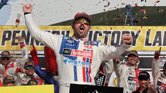 LAS VEGAS, NEVADA - MARCH 16: Josh Berry, driver of the #21 Motorcraft/Quick Lane Ford, celebrates in victory lane after winning the NASCAR Cup Series Pennzoil 400 at Las Vegas Motor Speedway on March 16, 2025 in Las Vegas, Nevada.