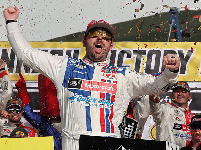 LAS VEGAS, NEVADA - MARCH 16: Josh Berry, driver of the #21 Motorcraft/Quick Lane Ford, celebrates in victory lane after winning the NASCAR Cup Series Pennzoil 400 at Las Vegas Motor Speedway on March 16, 2025 in Las Vegas, Nevada.