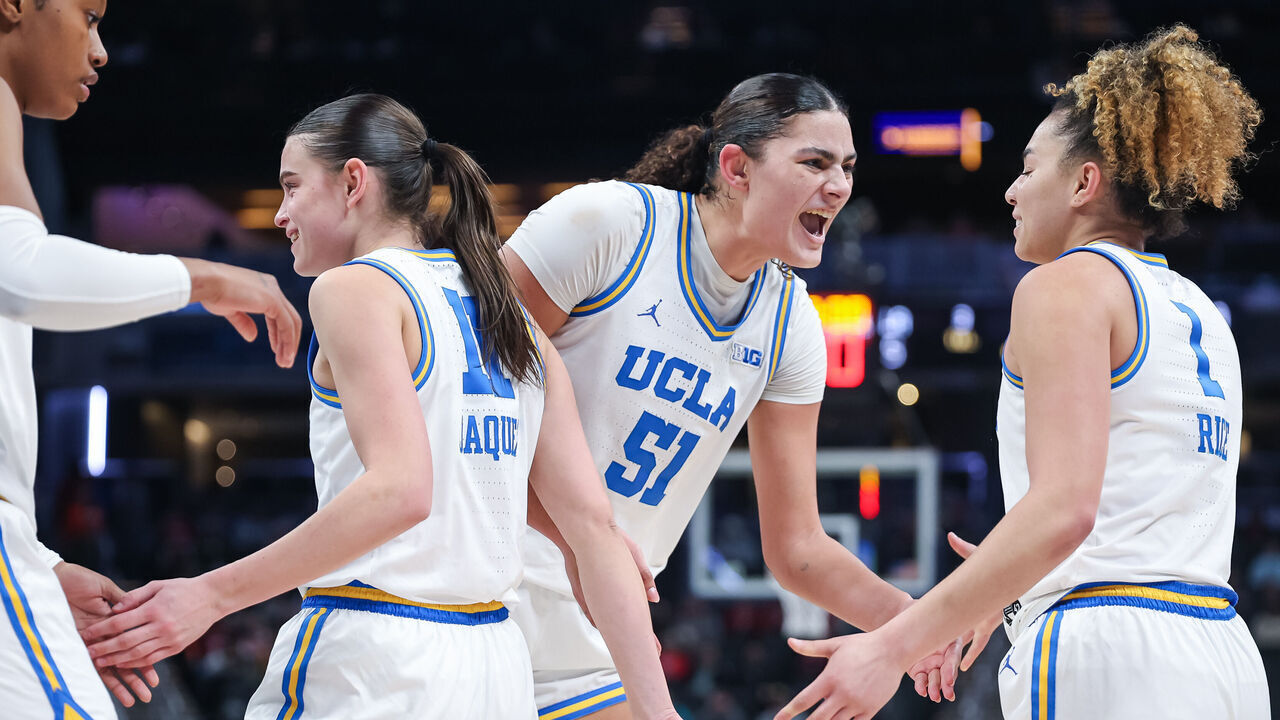 INDIANAPOLIS, INDIANA - MARCH 7: Lauren Betts #51 celebrates with Kiki Rice #1 of the UCLA Bruins during the game against the Nebraska Cornhuskers in the Big Ten Women's Basketball Tournament quarterfinals at Gainbridge Fieldhouse on March 7, 2025 in Indianapolis, Indiana.