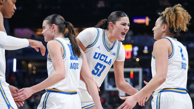 INDIANAPOLIS, INDIANA - MARCH 7: Lauren Betts #51 celebrates with Kiki Rice #1 of the UCLA Bruins during the game against the Nebraska Cornhuskers in the Big Ten Women's Basketball Tournament quarterfinals at Gainbridge Fieldhouse on March 7, 2025 in Indianapolis, Indiana.