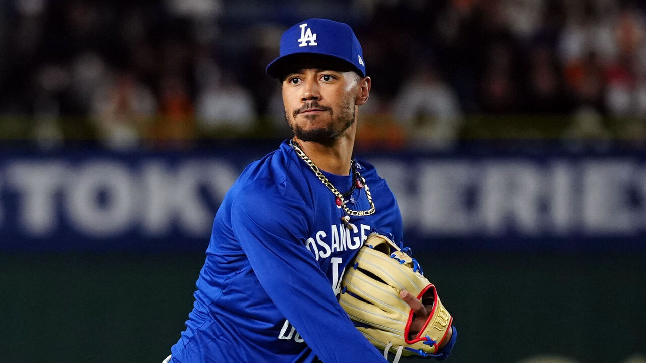 TOKYO, JAPAN - MARCH 15: Mookie Betts #50 of the Los Angeles Dodgers warms-up in the outfield prior to the game between the Los Angeles Dodgers and the Yomiuri Giants at Tokyo Dome on Saturday, March 15, 2025 in Tokyo, Japan.