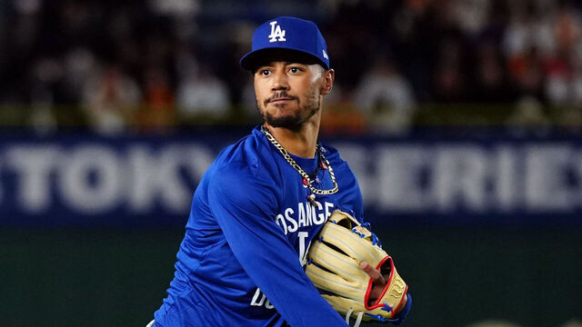 TOKYO, JAPAN - MARCH 15: Mookie Betts #50 of the Los Angeles Dodgers warms-up in the outfield prior to the game between the Los Angeles Dodgers and the Yomiuri Giants at Tokyo Dome on Saturday, March 15, 2025 in Tokyo, Japan.