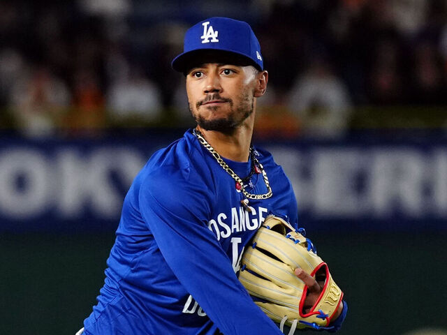 TOKYO, JAPAN - MARCH 15: Mookie Betts #50 of the Los Angeles Dodgers warms-up in the outfield prior to the game between the Los Angeles Dodgers and the Yomiuri Giants at Tokyo Dome on Saturday, March 15, 2025 in Tokyo, Japan.