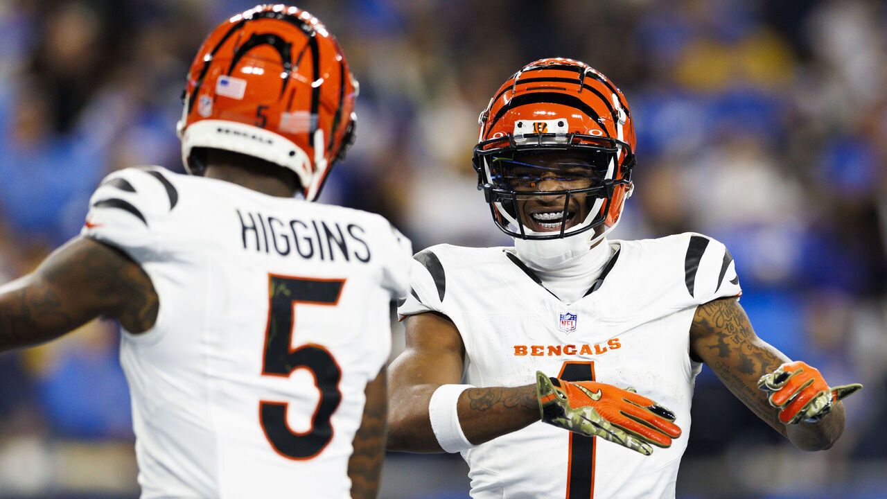 INGLEWOOD, CALIFORNIA - NOVEMBER 17: Tee Higgins #5 of the Cincinnati Bengals celebrates with Ja'Marr Chase #1 of the Cincinnati Bengals during the second half against the Los Angeles Chargers at SoFi Stadium on November 17, 2024 in Inglewood, California.