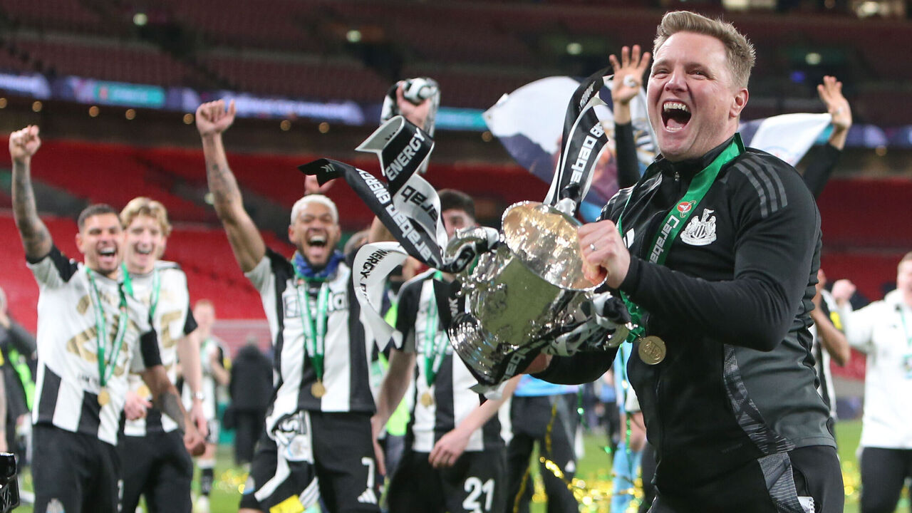 Newcastle United Manager Eddie Howe holds the trophy during the Carabao Cup Final between Liverpool and Newcastle United at Wembley Stadium in London, England, on March 16, 2025.