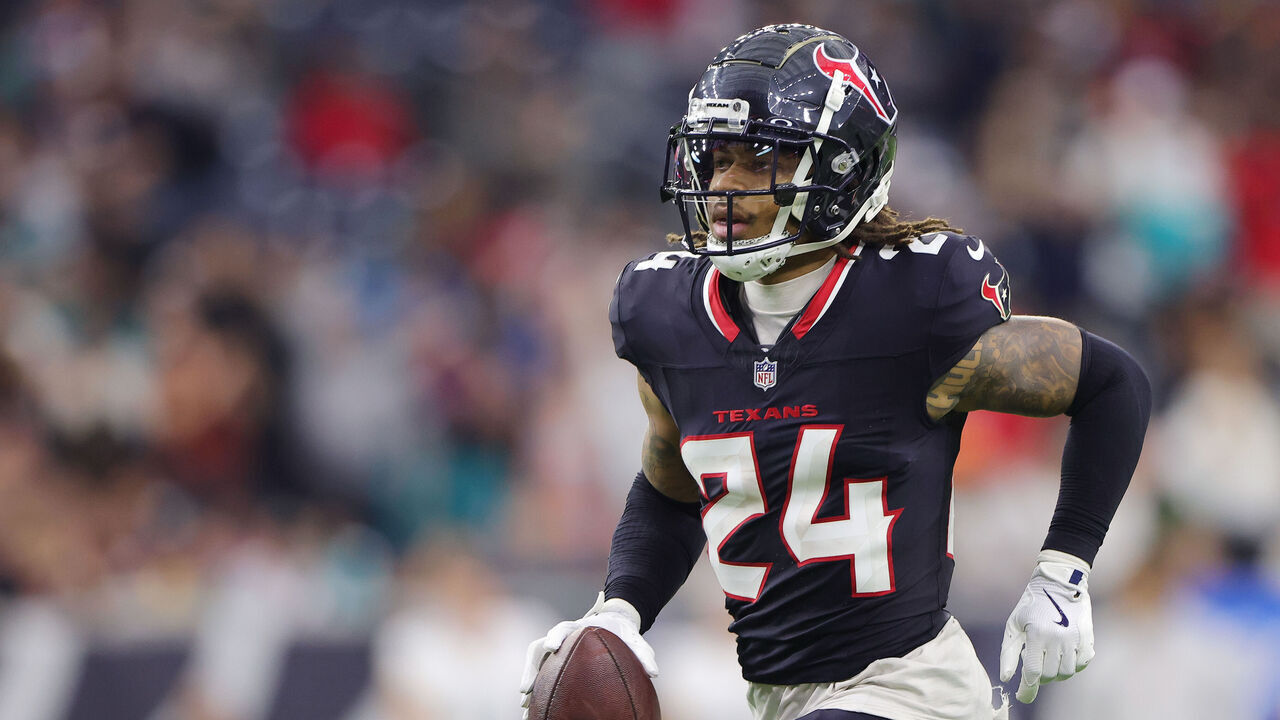 HOUSTON, TEXAS - DECEMBER 15: Derek Stingley Jr. #24 of the Houston Texans runs the ball against the Miami Dolphins during the second half at NRG Stadium on December 15, 2024 in Houston, Texas.