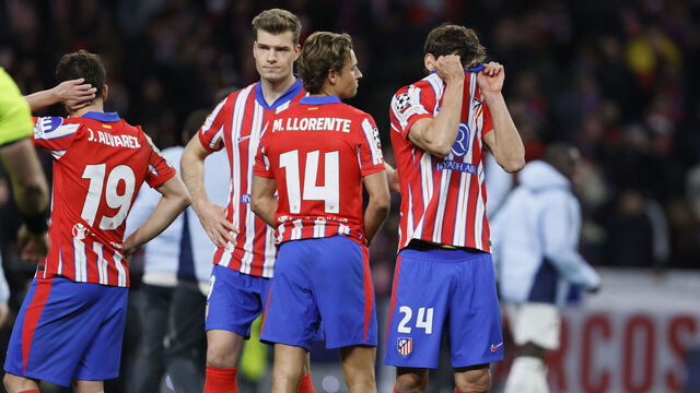 MADRID, SPAIN - MARCH 12: Julian Alvarez, Marcos Llorente and Robin Le Normand of Atletico Madrid look dejected after the UEFA Champions League 2024/25 UEFA Champions League 2024/25 Round of 16 second leg match between Atletico de Madrid and Real Madrid C.F. at Estadio Civitas Metropolitano on March 12, 2025 in Madrid, Spain.