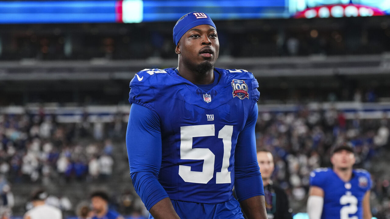 EAST RUTHERFORD, NJ - SEPTEMBER 26: Azeez Ojulari #51 of the New York Giants walks off of the field after an NFL football game against the Dallas Cowboys at MetLife Stadium on September 26, 2024 in East Rutherford, New Jersey.