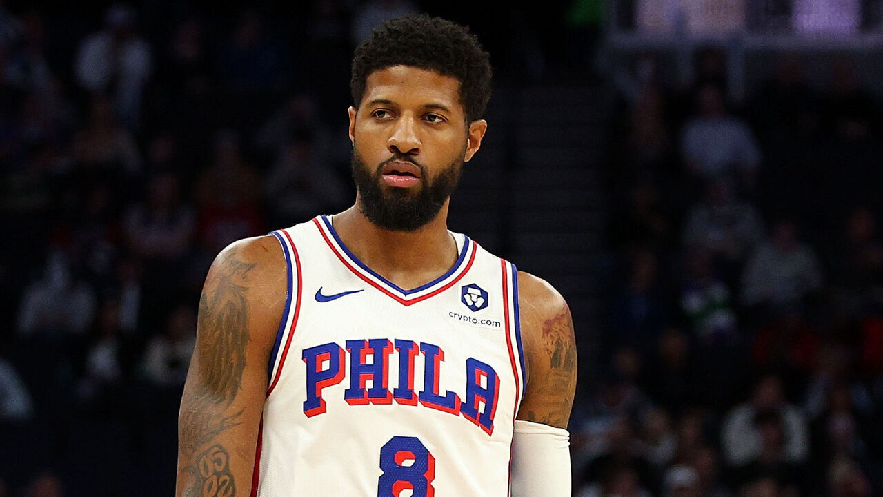 MINNEAPOLIS, MINNESOTA - MARCH 04: Paul George #8 of the Philadelphia 76ers looks on against the Minnesota Timberwolves in the first quarter at Target Center on March 04, 2025 in Minneapolis, Minnesota.