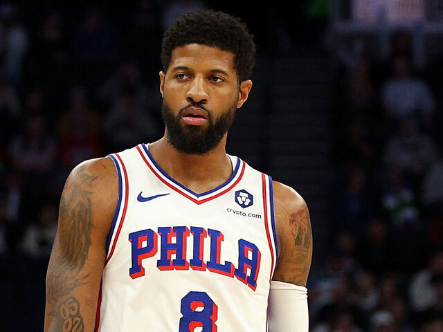 MINNEAPOLIS, MINNESOTA - MARCH 04: Paul George #8 of the Philadelphia 76ers looks on against the Minnesota Timberwolves in the first quarter at Target Center on March 04, 2025 in Minneapolis, Minnesota.