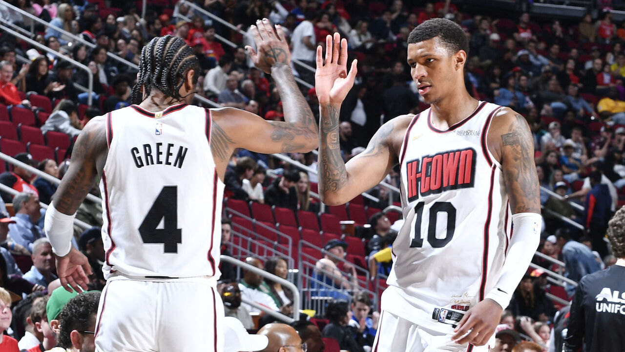 HOUSTON, TX - MARCH 10: Jalen Green #4 and Jabari Smith Jr. #10 of the Houston Rockets high five during the game against the Orlando Magic on March 10, 2025 at the Toyota Center in Houston, Texas. Mandatory Copyright Notice: Copyright 2025 NBAE
