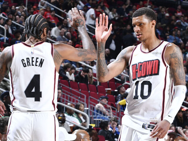 HOUSTON, TX - MARCH 10: Jalen Green #4 and Jabari Smith Jr. #10 of the Houston Rockets high five during the game against the Orlando Magic on March 10, 2025 at the Toyota Center in Houston, Texas. Mandatory Copyright Notice: Copyright 2025 NBAE