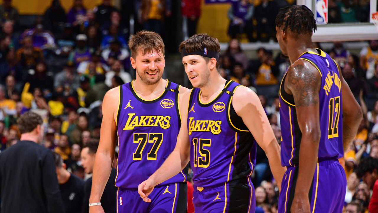 LOS ANGELES, CA - MARCH 17: Luka Doncic #77 talks to Austin Reaves #15 of the Los Angeles Lakers during the game against the San Antonio Spurs on March 17, 2025 at Crypto.Com Arena in Los Angeles, California. NOTE TO USER: User expressly acknowledges and agrees that, by downloading and/or using this Photograph, user is consenting to the terms and conditions of the Getty Images License Agreement. Mandatory Copyright Notice: Copyright 2025 NBAE