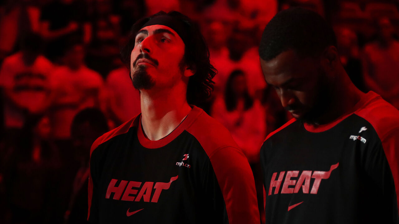MIAMI, FL - MARCH 14: Jaime Jaquez Jr. #11 of the Miami Heat stands for the National Anthem before the game against the Boston Celtics on March 14, 2025 at Kaseya Center in Miami, Florida. Mandatory Copyright Notice: Copyright 2025 NBAE