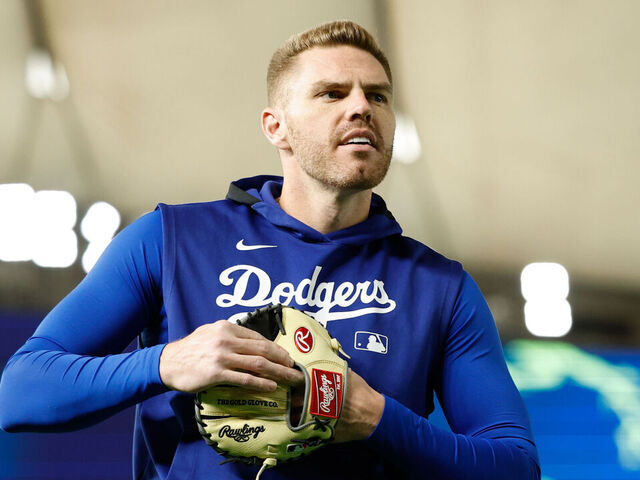 TOKYO, JAPAN - MARCH 18: Freddie Freeman #5 of the Los Angeles Dodgers warms up on the field prior to the game between the Los Angeles Dodgers and the Chicago Cubs at Tokyo Dome on Tuesday, March 18, 2025 in Tokyo, Japan.