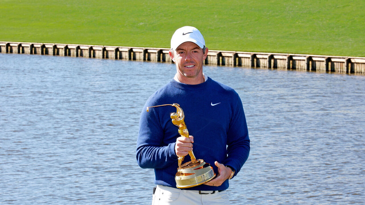 PONTE VEDRA BEACH, FL - MARCH 17: PGA golfer Rory McIlroy poses with the trophy after winning The Players Championship at the Stadium Course at TPC Sawgrass on March 17, 2025, at Ponte Verde Beach, Florida.