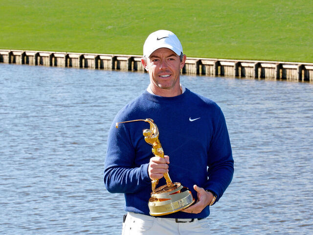 PONTE VEDRA BEACH, FL - MARCH 17: PGA golfer Rory McIlroy poses with the trophy after winning The Players Championship at the Stadium Course at TPC Sawgrass on March 17, 2025, at Ponte Verde Beach, Florida.