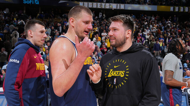 DENVER, CO - MARCH 14: Nikola Jokic #15 of the Denver Nuggets talks to Luka Doncic #77 of the Los Angeles Lakers after the game on March 14, 2025 at Ball Arena in Denver, Colorado. NOTE TO USER: User expressly acknowledges and agrees that, by downloading and/or using this Photograph, user is consenting to the terms and conditions of the Getty Images License Agreement. Mandatory Copyright Notice: Copyright 2025 NBAE