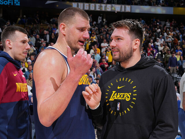 DENVER, CO - MARCH 14: Nikola Jokic #15 of the Denver Nuggets talks to Luka Doncic #77 of the Los Angeles Lakers after the game on March 14, 2025 at Ball Arena in Denver, Colorado. NOTE TO USER: User expressly acknowledges and agrees that, by downloading and/or using this Photograph, user is consenting to the terms and conditions of the Getty Images License Agreement. Mandatory Copyright Notice: Copyright 2025 NBAE