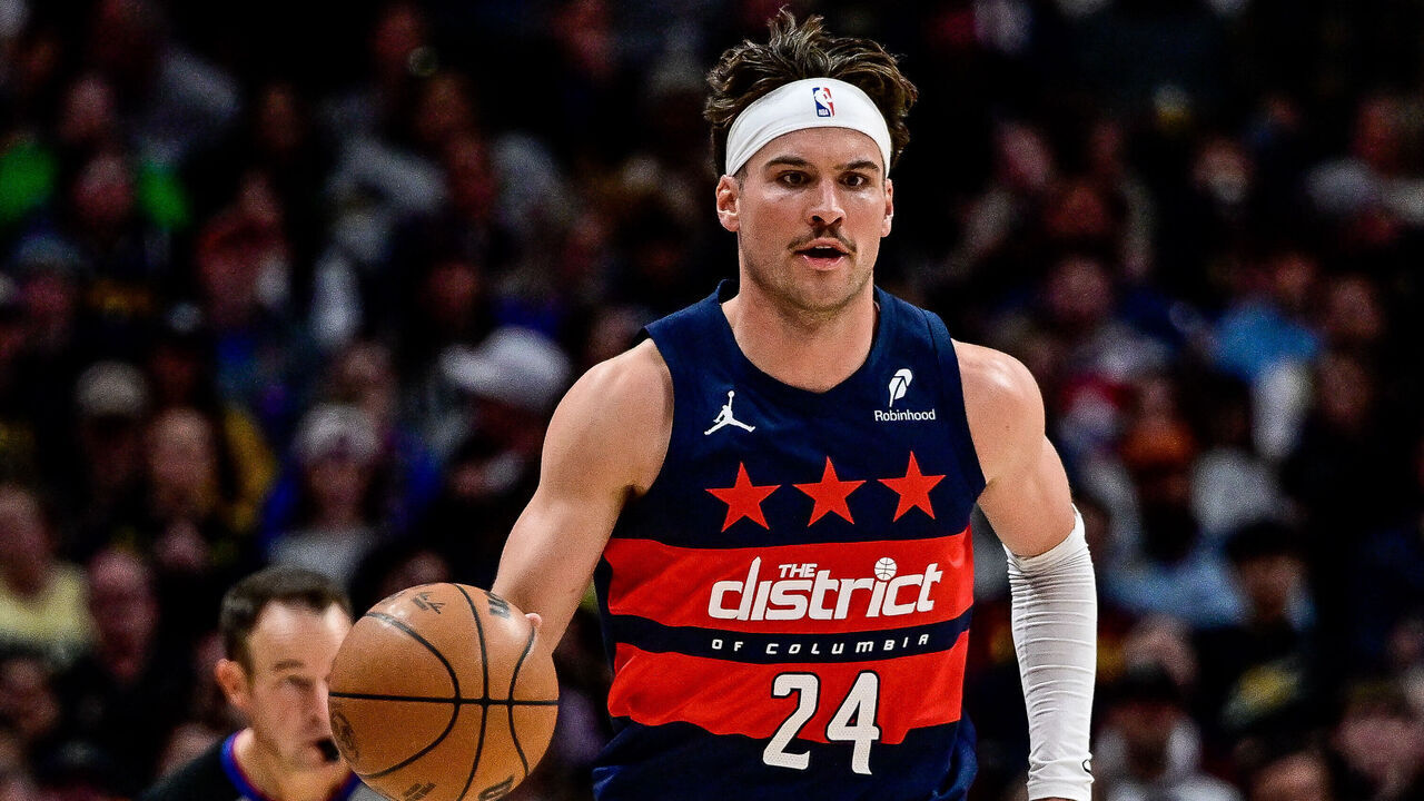 DENVER, COLORADO - MARCH 15: Corey Kispert #24 of the Washington Wizards dribbles against the Denver Nuggets in the first half at Ball Arena on March 15, 2025 in Denver, Colorado.