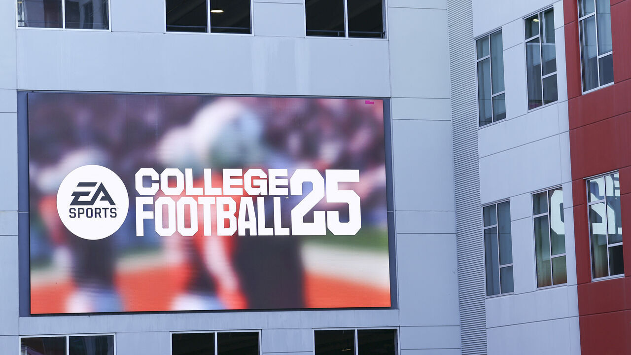 ORLANDO, FLORIDA - JANUARY 31: A video billboard adverting for EA Sports College Football 25 on the outside of an office building on January 31, 2025 in Orlando, Florida.